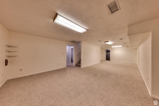 4230 S Beeman Rd, Moab, UT 84532 - basement featuring a textured ceiling and carpet