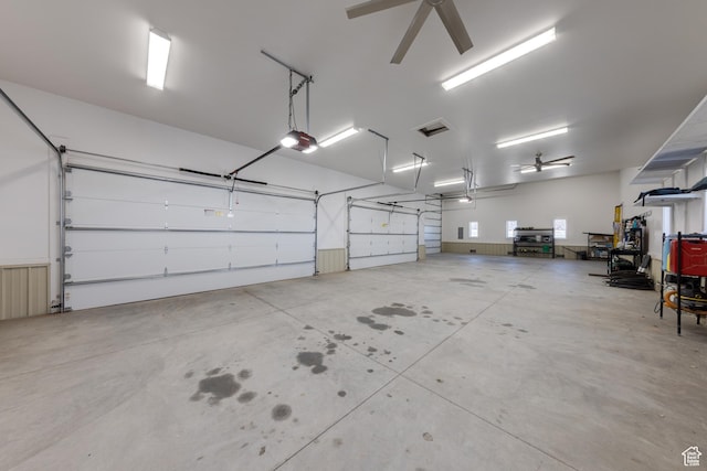 4230 S Beeman Rd, Moab, UT 84532 - garage with ceiling fan and a garage door opener