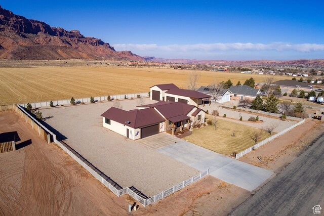 4230 S Beeman Rd, Moab, UT 84532 - drone / aerial view featuring a mountain view and a rural view