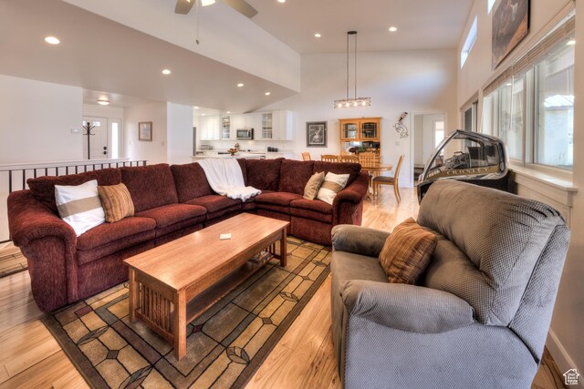 4230 S Beeman Rd, Moab, UT 84532 - living room with ceiling fan, high vaulted ceiling, and light hardwood / wood-style floors