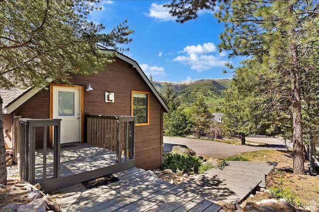 3388 N Eden Hills Dr, Eden, UT 84310 - view of side of property with a deck with mountain view