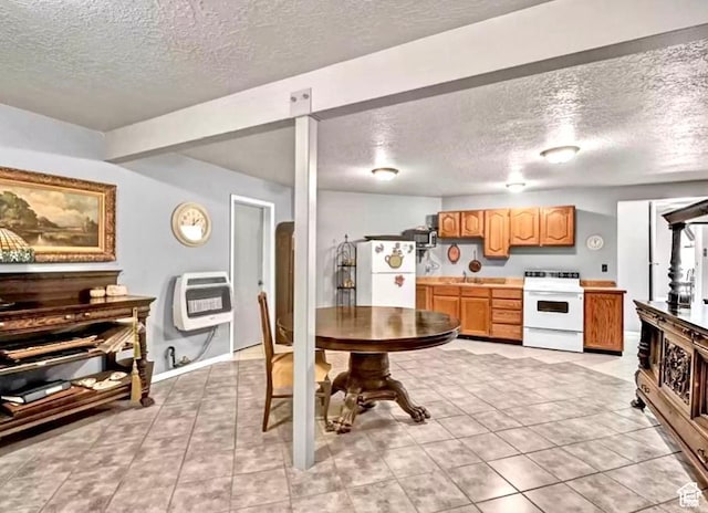 3388 N Eden Hills Dr, Eden, UT 84310 - kitchen with heating unit, a textured ceiling, and white appliances