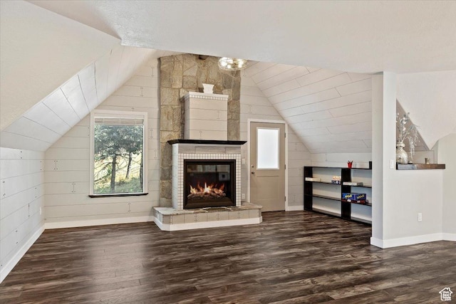 3388 N Eden Hills Dr, Eden, UT 84310 - additional living space with dark hardwood / wood-style flooring, vaulted ceiling, and a large fireplace