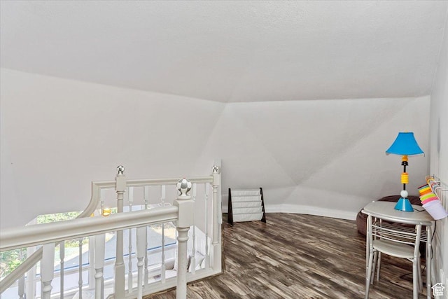 3388 N Eden Hills Dr, Eden, UT 84310 - additional living space featuring vaulted ceiling and hardwood / wood-style floors