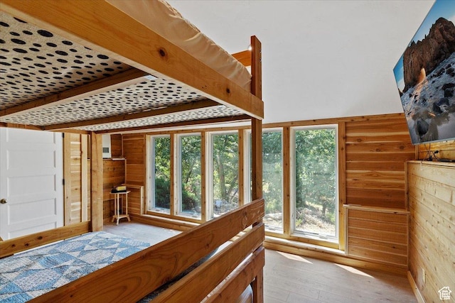 3388 N Eden Hills Dr, Eden, UT 84310 - bedroom with wooden walls and light wood-type flooring