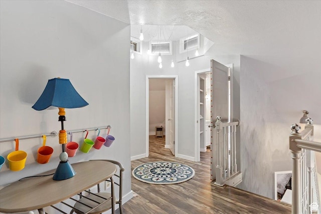 3388 N Eden Hills Dr, Eden, UT 84310 - corridor featuring wood-type flooring and a textured ceiling