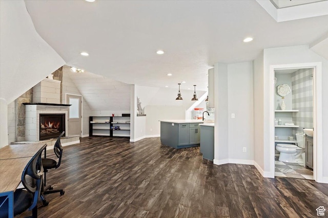 3388 N Eden Hills Dr, Eden, UT 84310 - office area with a large fireplace, lofted ceiling, dark hardwood / wood-style floors, and sink