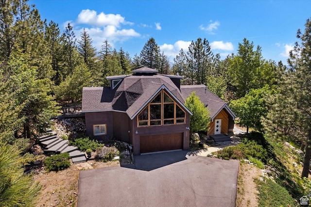 3388 N Eden Hills Dr, Eden, UT 84310 - view of front of house with a garage