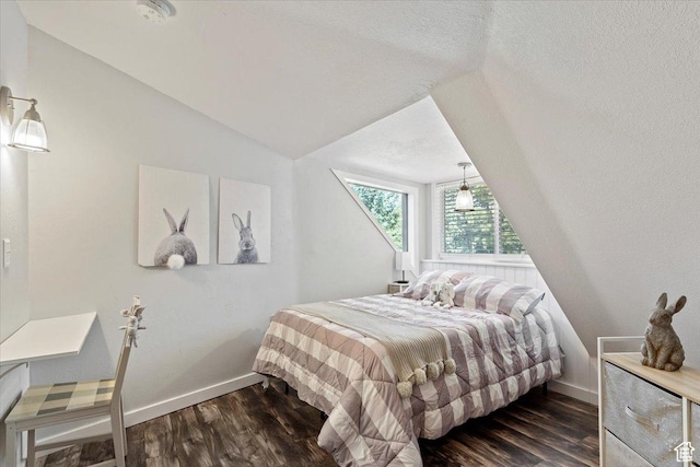 3388 N Eden Hills Dr, Eden, UT 84310 - bedroom featuring dark wood-type flooring and vaulted ceiling