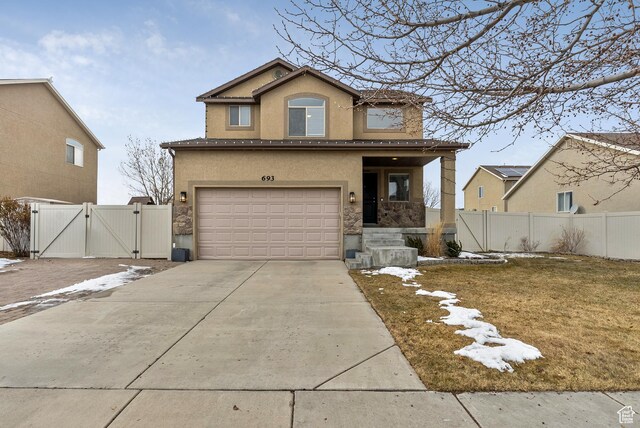 693 N Devonshire Dr, Saratoga Springs, UT 84045 - front facade featuring a garage