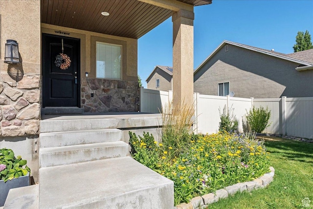 693 N Devonshire Dr, Saratoga Springs, UT 84045 - property entrance featuring stone siding and stucco siding