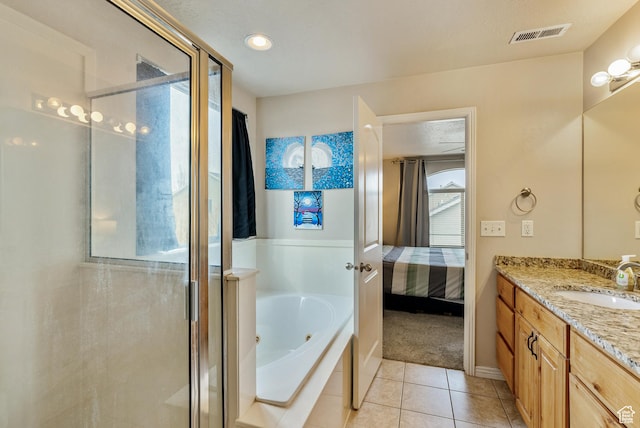 693 N Devonshire Dr, Saratoga Springs, UT 84045 - bathroom featuring tile patterned floors, vanity, and independent shower and bath