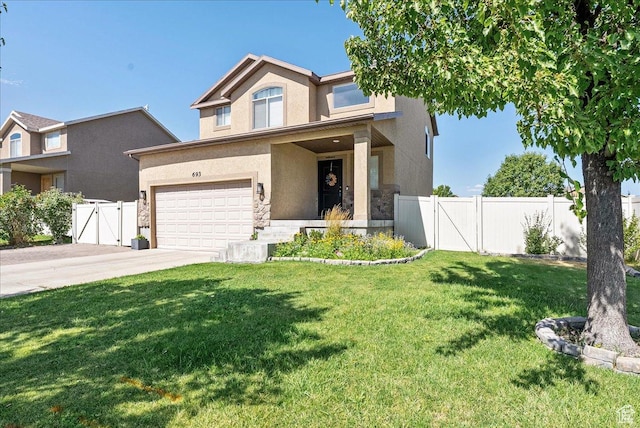 693 N Devonshire Dr, Saratoga Springs, UT 84045 - traditional home with a gate, stucco siding, driveway, stone siding, and a garage