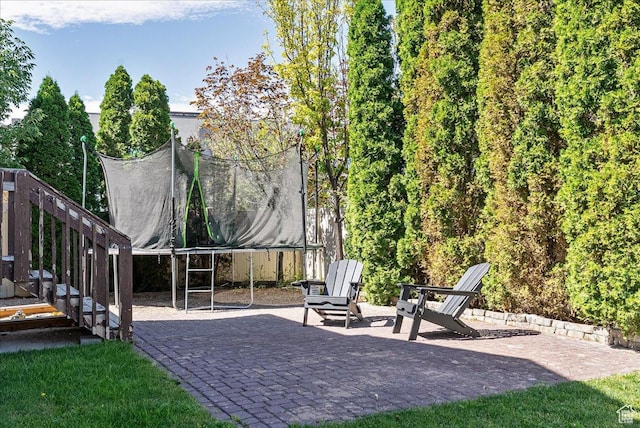 693 N Devonshire Dr, Saratoga Springs, UT 84045 - view of patio with a trampoline