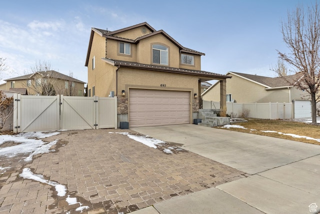693 N Devonshire Dr, Saratoga Springs, UT 84045 - front of property with a garage