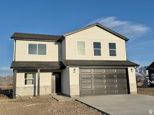 view of front facade with a garage and driveway