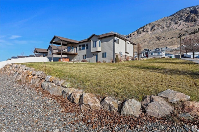 1321 Highland Blvd N, Brigham City, UT 84302 - view of home's exterior with a mountain view and a balcony