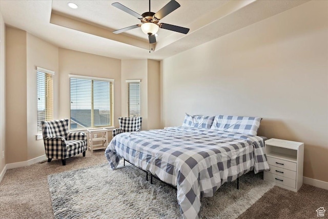 1321 Highland Blvd N, Brigham City, UT 84302 - carpeted bedroom with baseboards, a raised ceiling, and ceiling fan