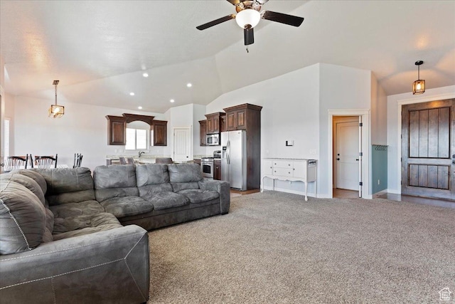 1321 Highland Blvd N, Brigham City, UT 84302 - living room with vaulted ceiling, ceiling fan, light colored carpet, and baseboards