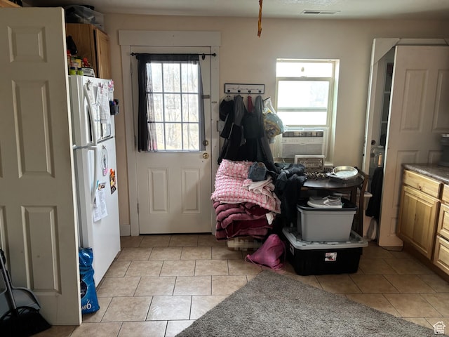43 W Center, Centerfield, UT 84622 - doorway to outside with visible vents and light tile patterned flooring