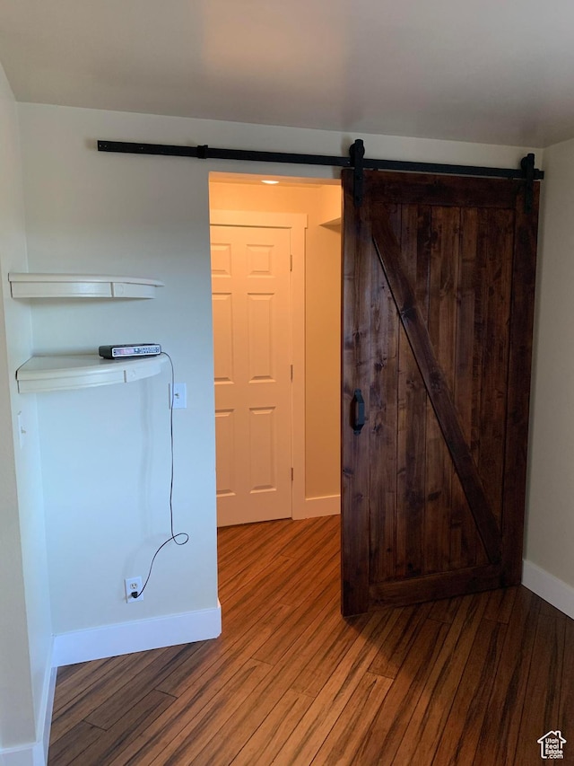 685 W 2550 S, Price, UT 84501 - interior space with wood-type flooring and a barn door