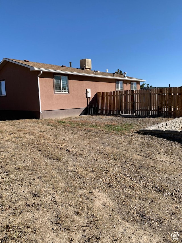 685 W 2550 S, Price, UT 84501 - rear view of property featuring central air condition unit