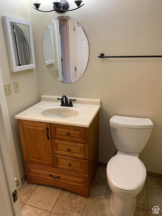 685 W 2550 S, Price, UT 84501 - bathroom with tile patterned floors, vanity, and toilet