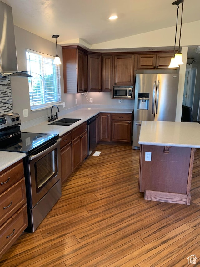 685 W 2550 S, Price, UT 84501 - kitchen with sink, ventilation hood, stainless steel appliances, and hanging light fixtures