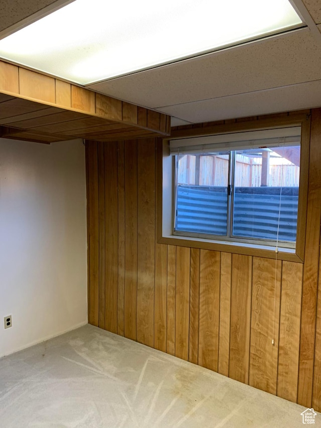 685 W 2550 S, Price, UT 84501 - spare room featuring carpet flooring and wood walls