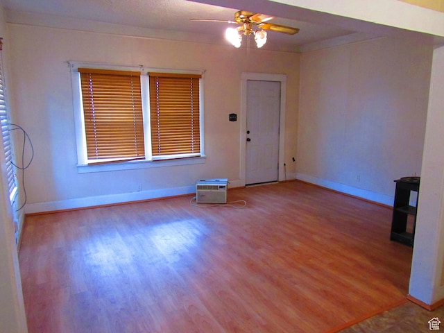 interior space featuring crown molding, ceiling fan, and light hardwood / wood-style floors