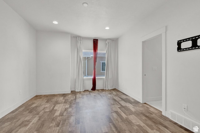 1726 W Thira Ln S, South Jordan, UT 84095 - unfurnished room with wood finished floors, baseboards, and recessed lighting