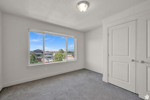 1726 W Thira Ln S, South Jordan, UT 84095 - empty room with carpet floors, baseboards, and a textured ceiling