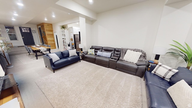 living room featuring light colored carpet
