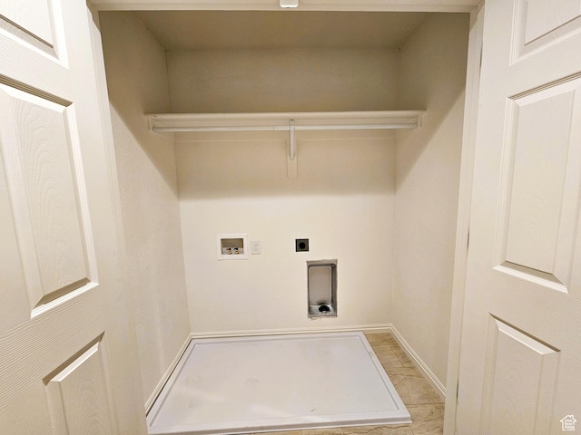 laundry room featuring laundry area, hookup for an electric dryer, and hookup for a washing machine