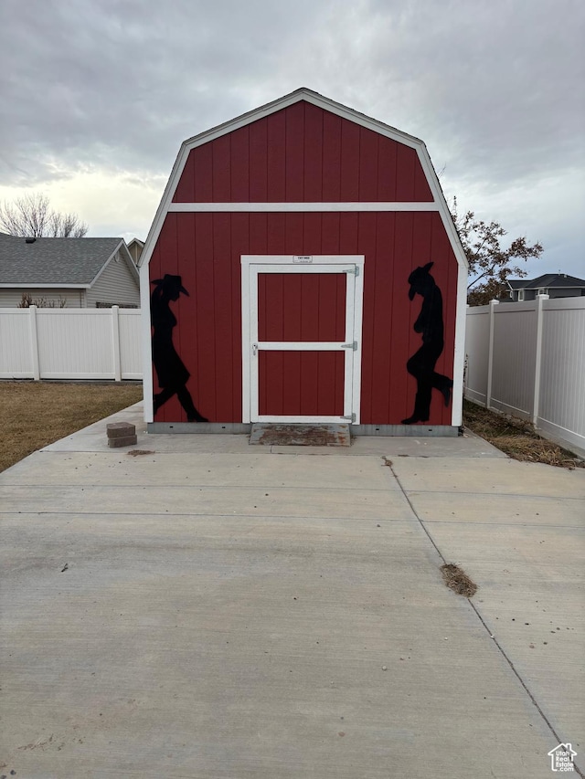 view of shed featuring a fenced backyard