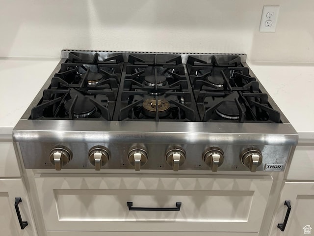 details with light countertops and stove