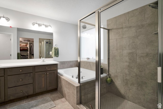 3529 W 4150 S, West Haven, UT 84401 - bathroom featuring tile patterned floors, vanity, and separate shower and tub