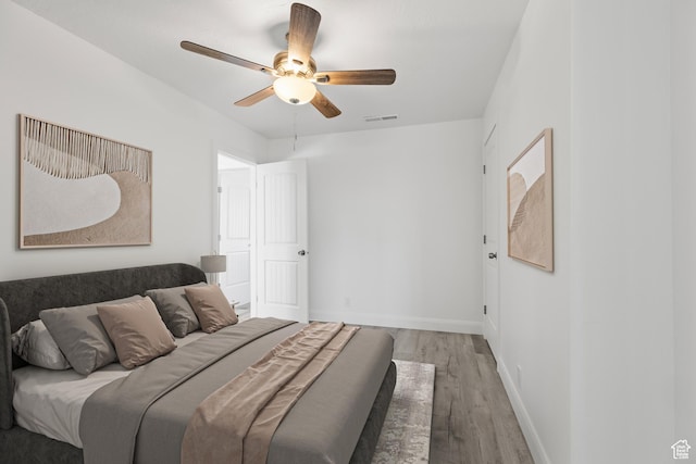 1980 W 3600 N, Beryl, UT 84714 - bedroom featuring light wood-type flooring, baseboards, and a ceiling fan