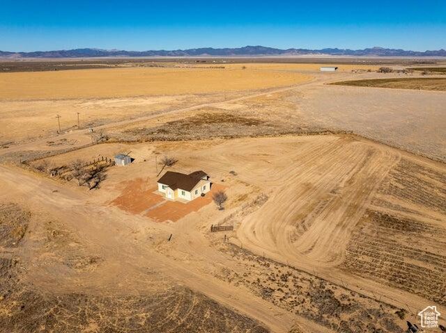 1980 W 3600 N, Beryl, UT 84714 - aerial view of sparsely populated area featuring a mountainous background and a desert landscape
