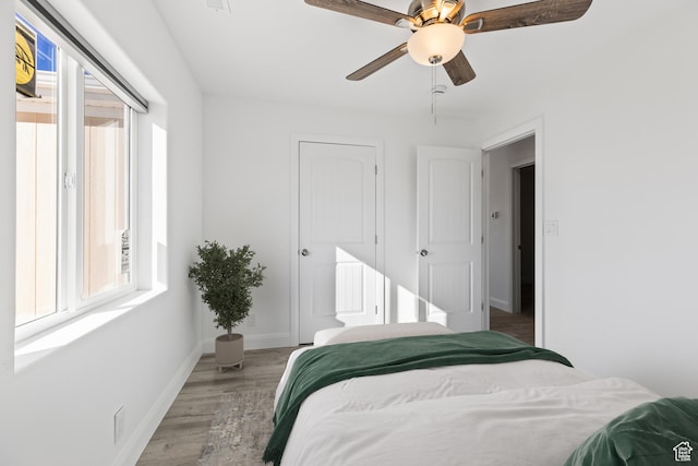 1980 W 3600 N, Beryl, UT 84714 - bedroom featuring light wood-style floors, baseboards, and a ceiling fan