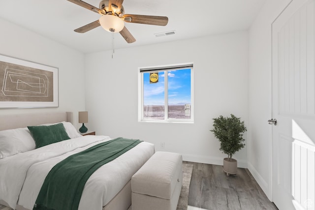 1980 W 3600 N, Beryl, UT 84714 - bedroom featuring wood finished floors, baseboards, and ceiling fan