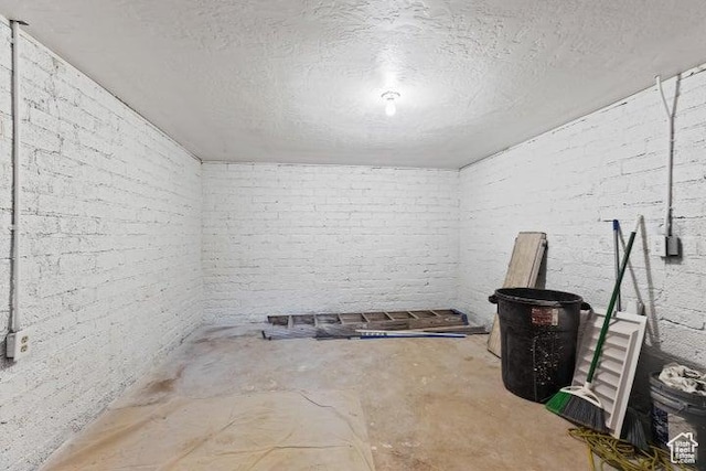 1980 W 3600 N, Beryl, UT 84714 - basement with brick wall and a textured ceiling