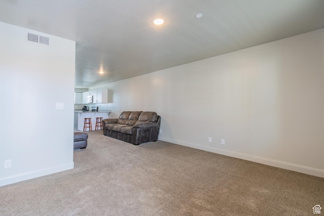 128 N Lone Rock Dr Unit 204, Hurricane, UT 84737 - living room with light colored carpet and baseboards