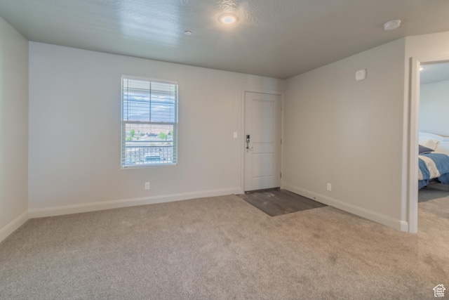 128 N Lone Rock Dr Unit 204, Hurricane, UT 84737 - entrance foyer with carpet floors and baseboards