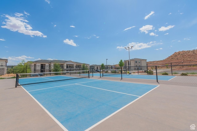 128 N Lone Rock Dr Unit 204, Hurricane, UT 84737 - view of tennis court featuring a residential view