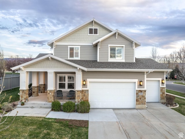 2654 E Water Wheel Ct, Heber City, UT 84032 - craftsman-style house with a porch and a garage