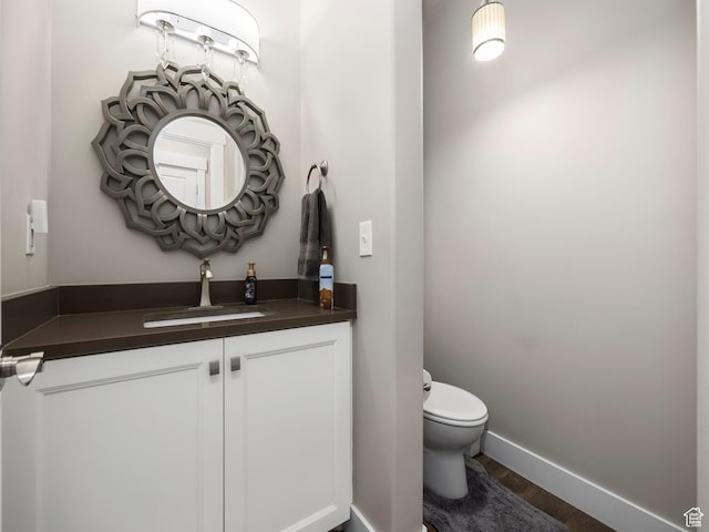 2654 E Water Wheel Ct, Heber City, UT 84032 - bathroom with vanity, wood-type flooring, and toilet