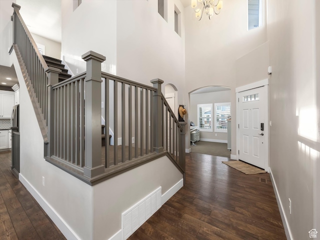 2654 E Water Wheel Ct, Heber City, UT 84032 - entrance foyer with dark hardwood / wood-style flooring, a chandelier, and a high ceiling