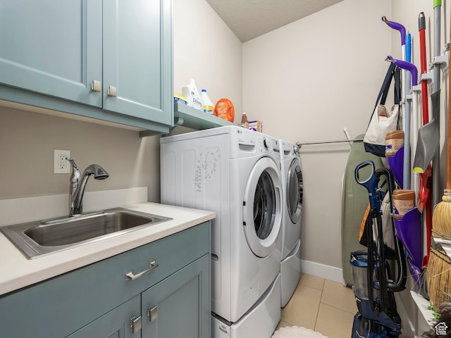 2654 E Water Wheel Ct, Heber City, UT 84032 - clothes washing area featuring cabinets, independent washer and dryer, sink, and light tile patterned floors