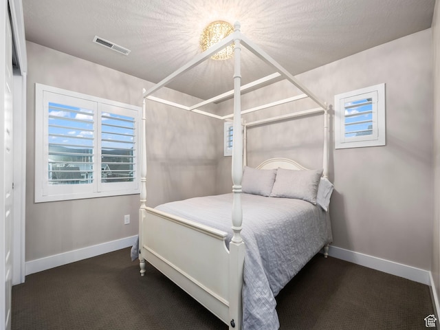 2654 E Water Wheel Ct, Heber City, UT 84032 - carpeted bedroom featuring a textured ceiling